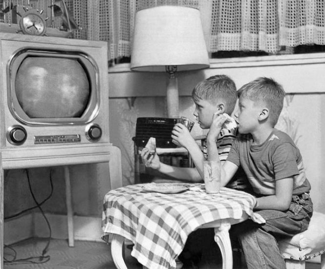 Vintage Television watching family